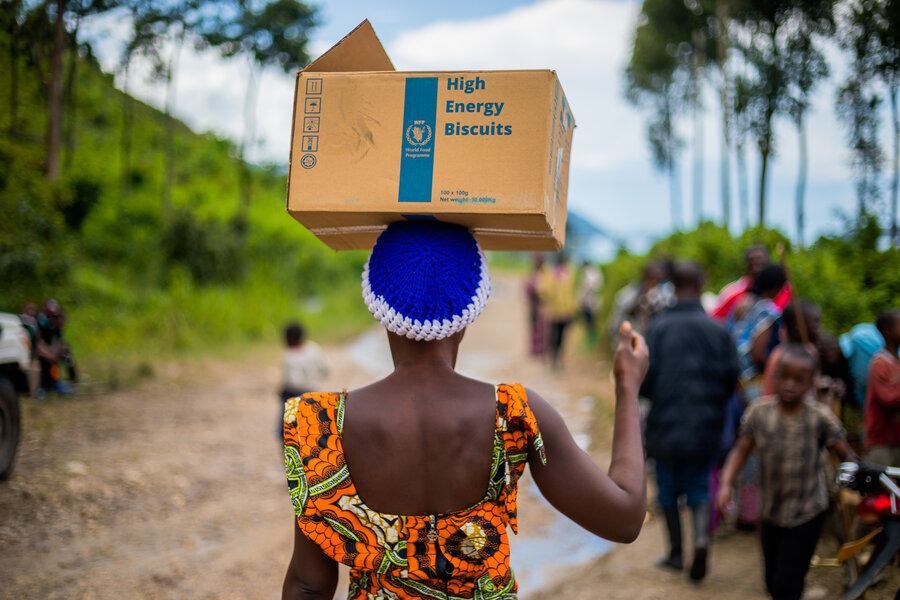 World Food Programme lady carrying food